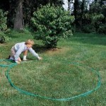 measuring flower bed with hose